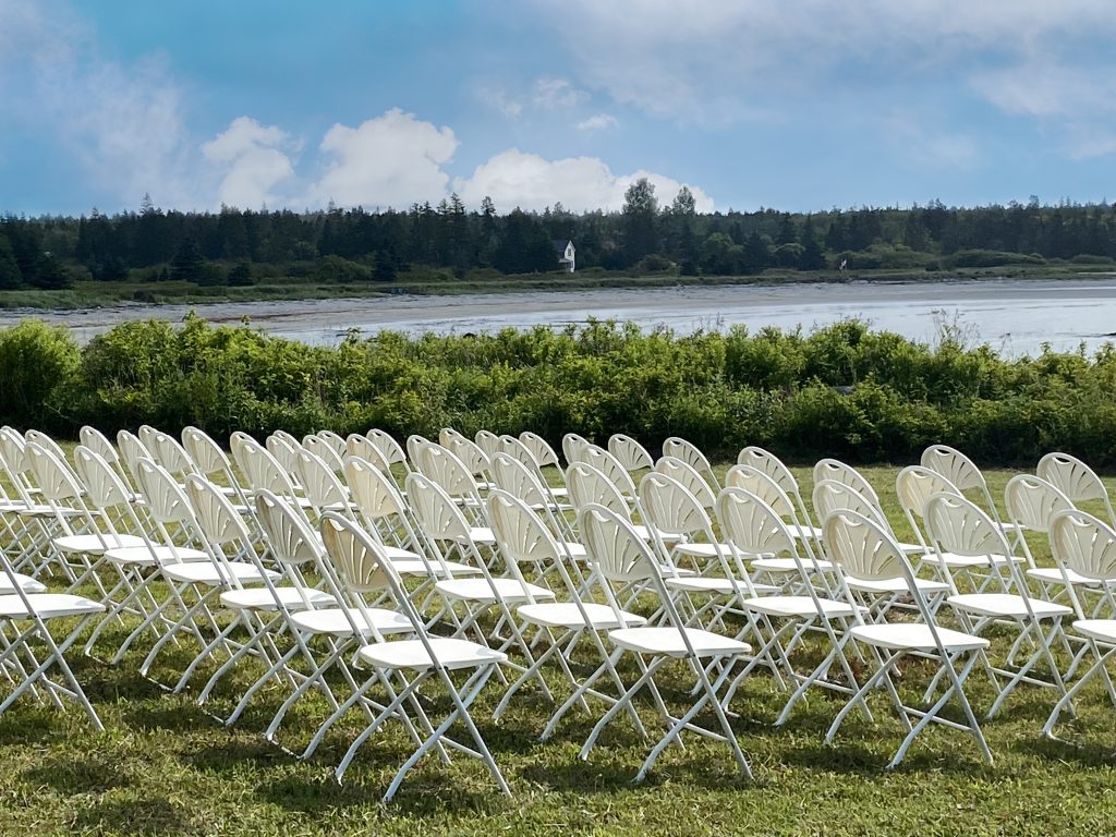 Photo of chairs set up for a wedding.